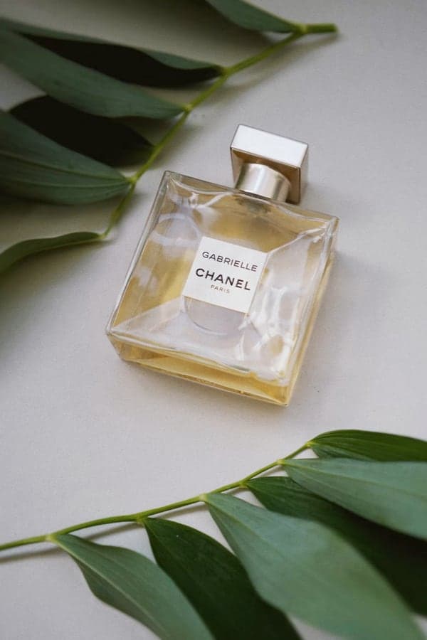 elegant, square-shaped perfume bottle with Gabrielle and CHANEL wordmarks